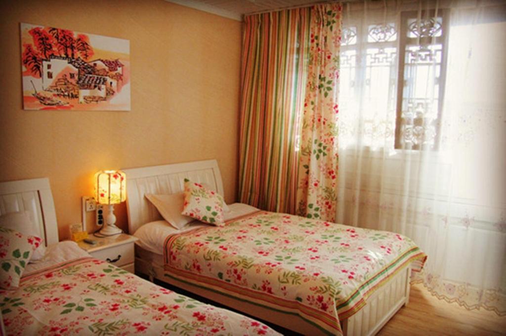 Yunxi Inn Ліцзян Номер фото