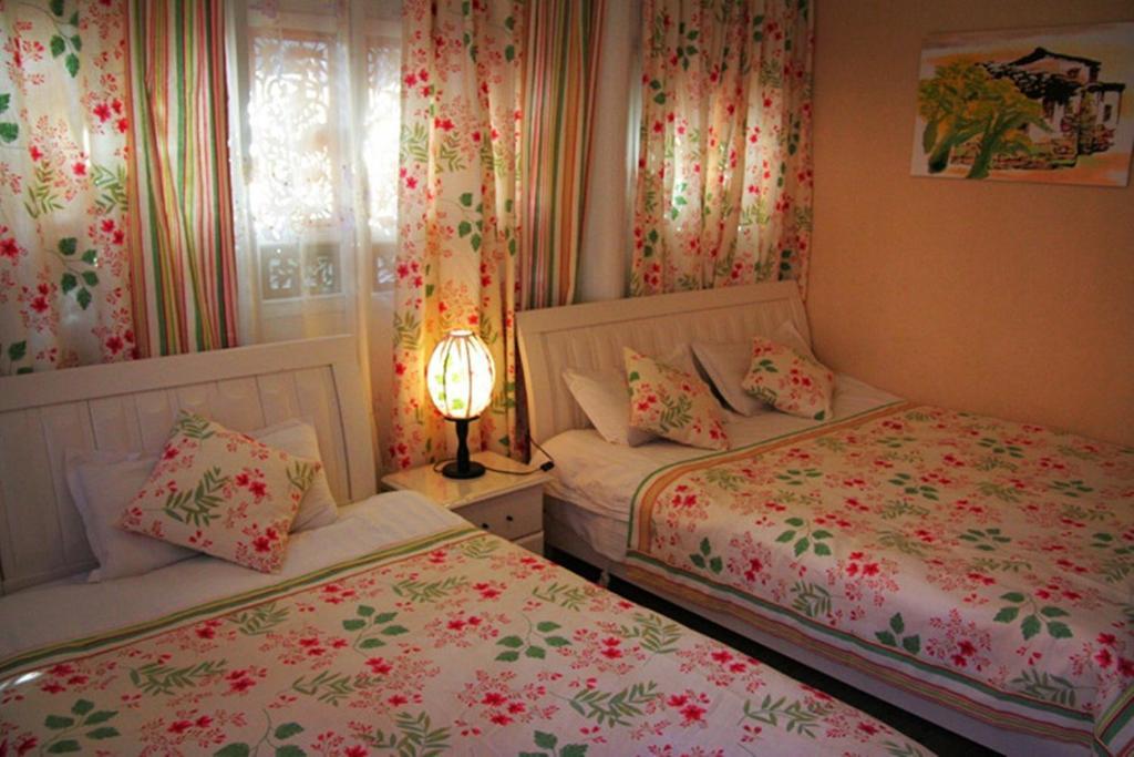 Yunxi Inn Ліцзян Номер фото