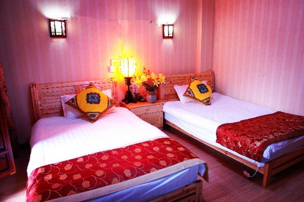 Yunxi Inn Ліцзян Номер фото
